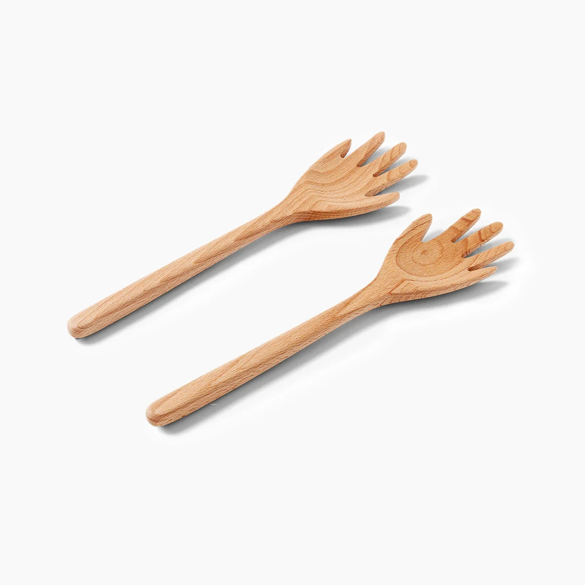 Two wooden salad servers on a white background