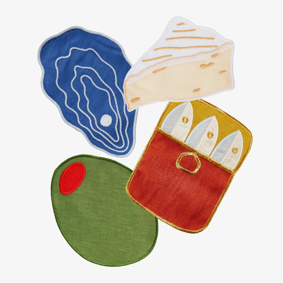 Set of four colorful coasters shaped like an oyster, cheese, olive, and sardines on a white background.