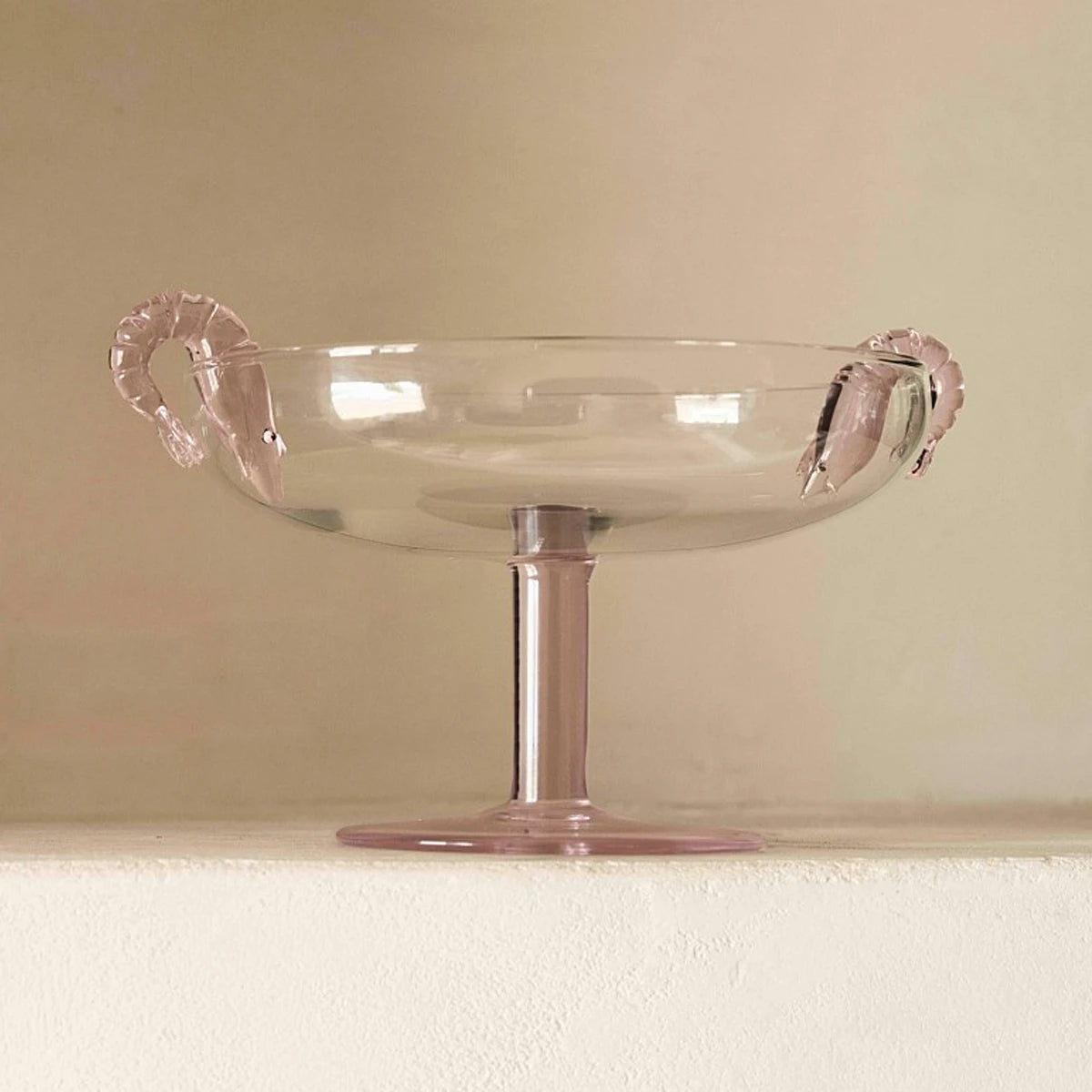 Pink glass platter with prawn handles