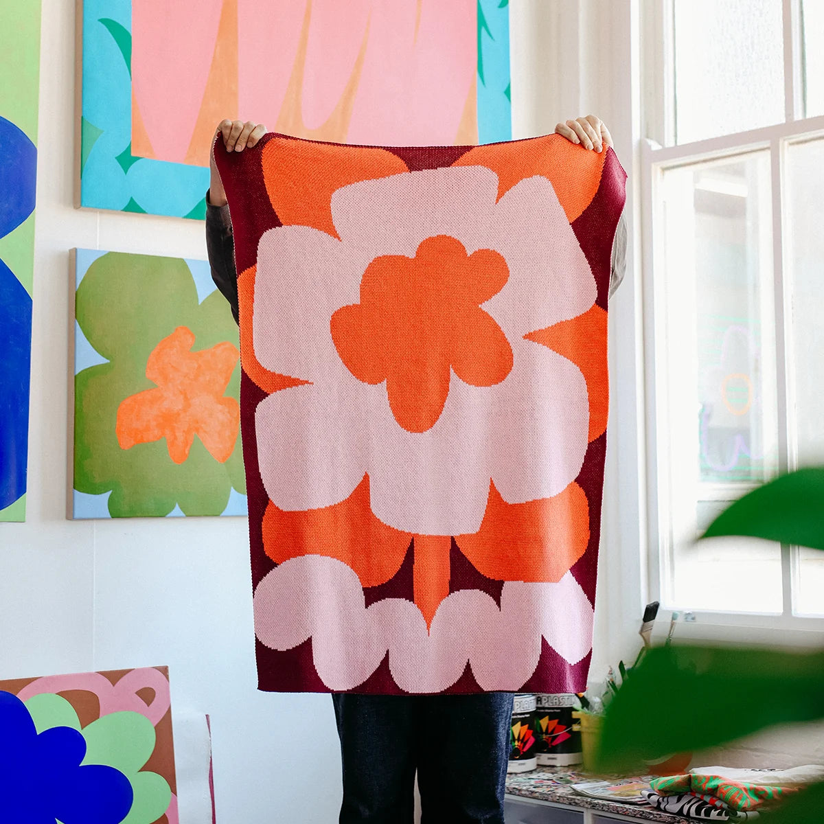 Petal pop Mini Knit Blanket by Slowdown Studio designed in collaboration with artist Micke Lindebergh