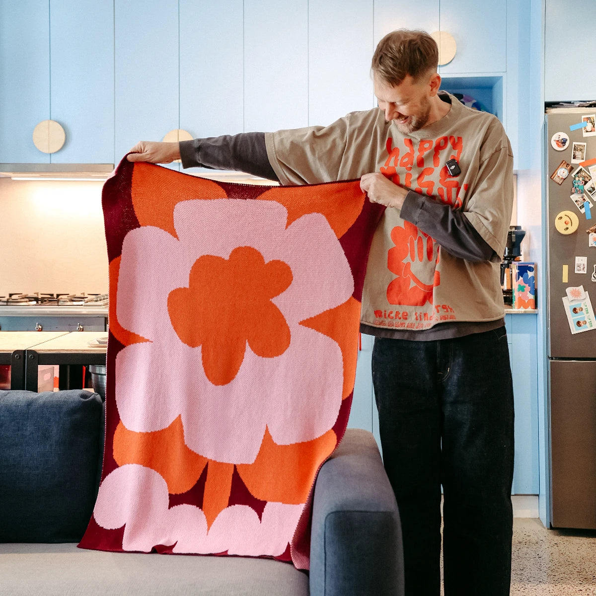 Petal pop Mini Knit Blanket by Slowdown Studio designed in collaboration with artist Micke Lindebergh