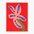 Framed abstract floral wall art featuring a pink flower with blue and green accents on a bright red background, enclosed in a light natural wood frame.
