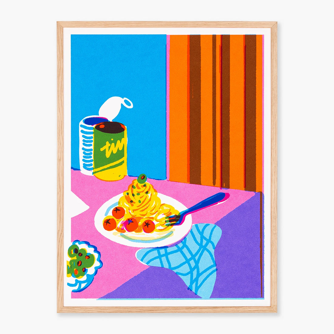 Kitchen wall art of a framed pop-art style print depicting a table scene with spaghetti, tomatoes, a can of soup, a plate of olives, and a blue chair, shown in a light wood frame against a white background.