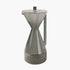 Gray glass hourglass-shaped pourover carafe on a white background