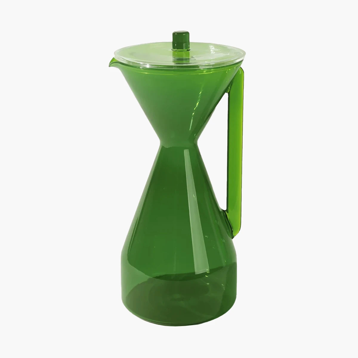 Green glass carafe on a white background